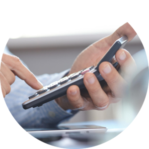 Person using a calculator to estimate business savings, tax benefits and registered office service costs in Hungary