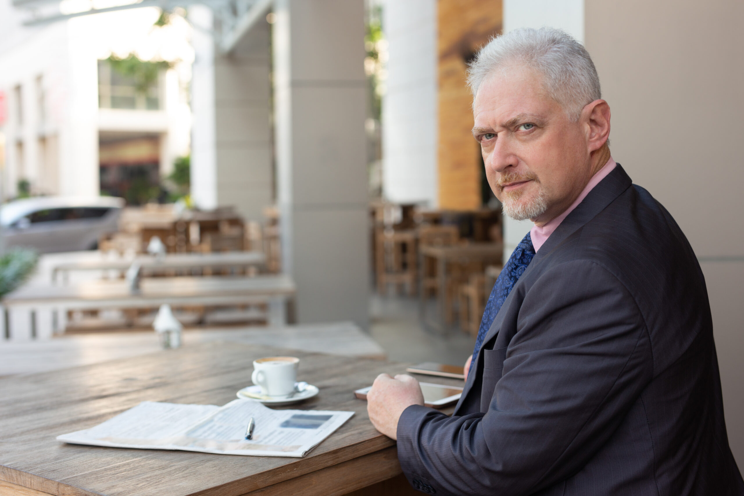 Foreign investor establishing a company in Hungary Businessman reviewing documents representing foreign investors establishing companies in Hungary through registered office services