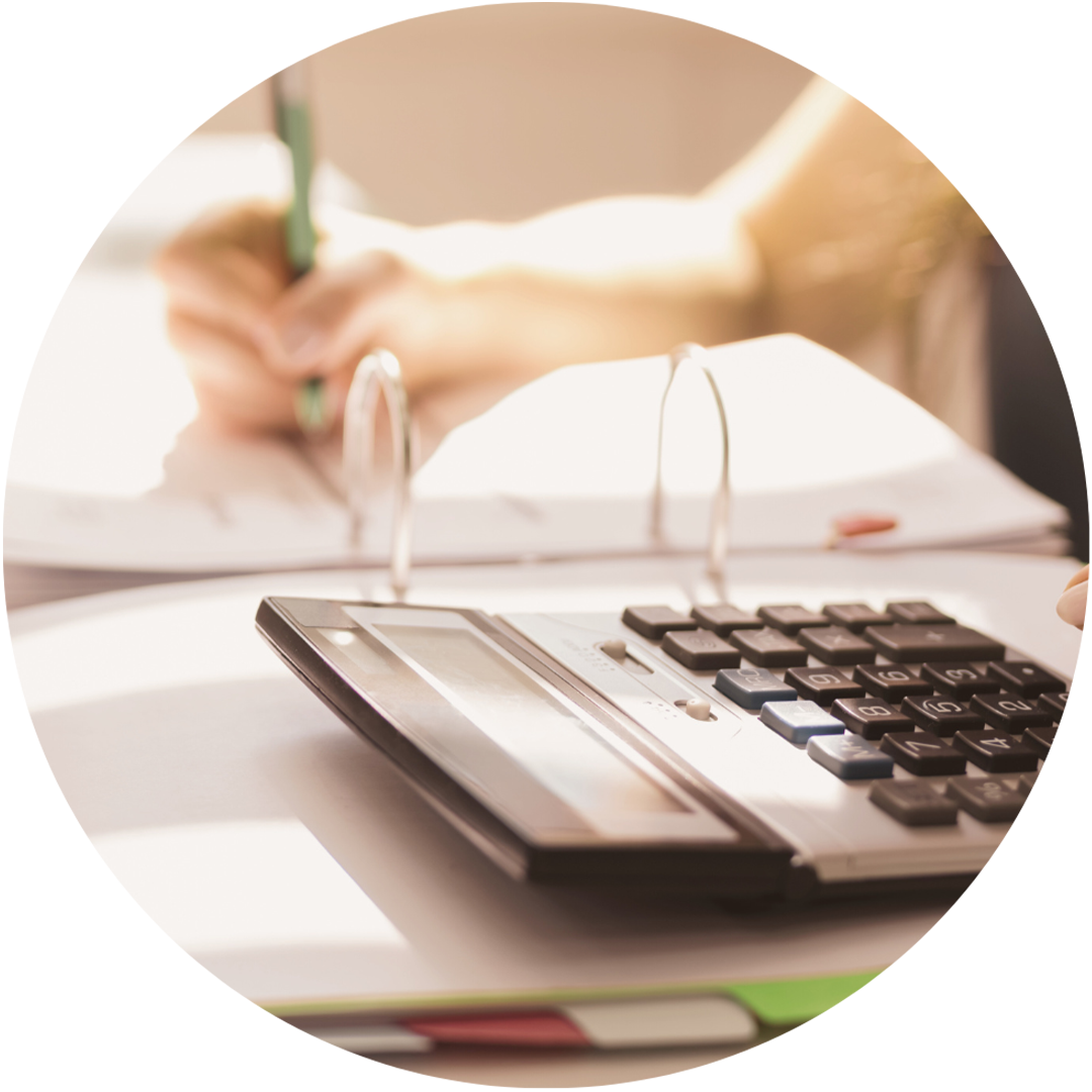 Calculator and business documents representing tax calculation, local business tax optimization and registered office services in Hungary
